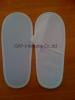 Disposable nonwoven slipper for spa