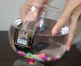 Mobile Phone Watch Waterproof นาฬิกาโทรศัพท์มือถือกันน้ำ MPW-400 พร้อมกล้องดิจิตอล 1.3 เมกกะพิกเซล (P0013)