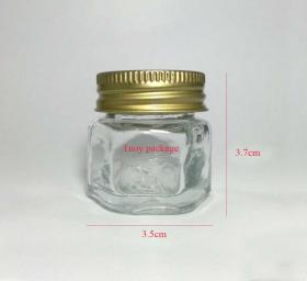 ขวดยาหม่องตราถ้วยทอง