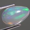 1.32ct NATURAL WHITE OPAL WITH PLAY OF COLOR โอปอล ธรรมชาติ สีขาวเหลือบเล่นสีพลอยเดือนตุลา