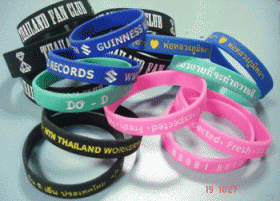 จำหน่ายและรับผลิต สายรัดข้อมือ,ริสแบนด์,WRISTBAND,ริสแบนด์ลงสีตัวอักษร ตามความต้องไม่จำกัดขั้นต่ำสำหรับงานปั๊มจมธรรมดาทั่วไปเหมือนกับเรารักในหลวง