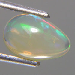1.35ctโอปอ ธรรมชาติ สีเหลืองเหลือบเล่นสี พลอยเดือนตุลาคม NATURAL OPAL WITH PLAY OF COLOR