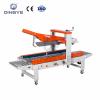 เครื่องพับปากกล่องอัตโนมัติและปิดกล่องด้วยเทปกาว บ Carton sealer FX-AT5050