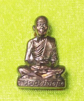 รูปเหมือนปั้มหลวงพ่อคูณ วัดบ้านไร่ รุ่นเทพเจริญพร ปี 2557 เนื้อทองแดง (กรรมการ)